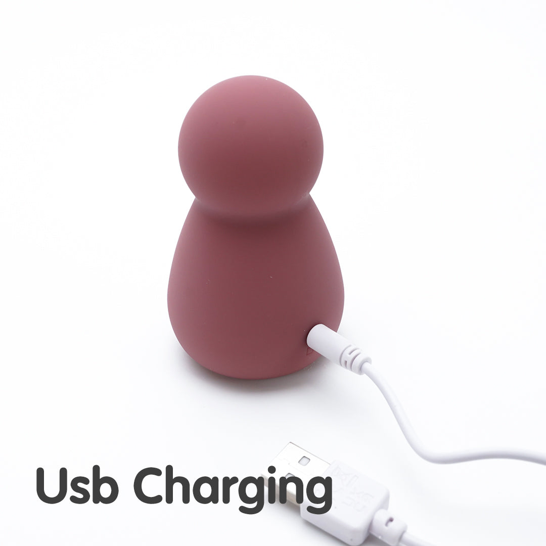 Powder Puff Love Egg Vibrator charging with USB cable