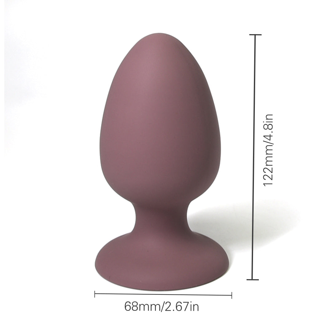 Brown anal plug with size guide: 122mm/4.8in and 68mm/2.67in