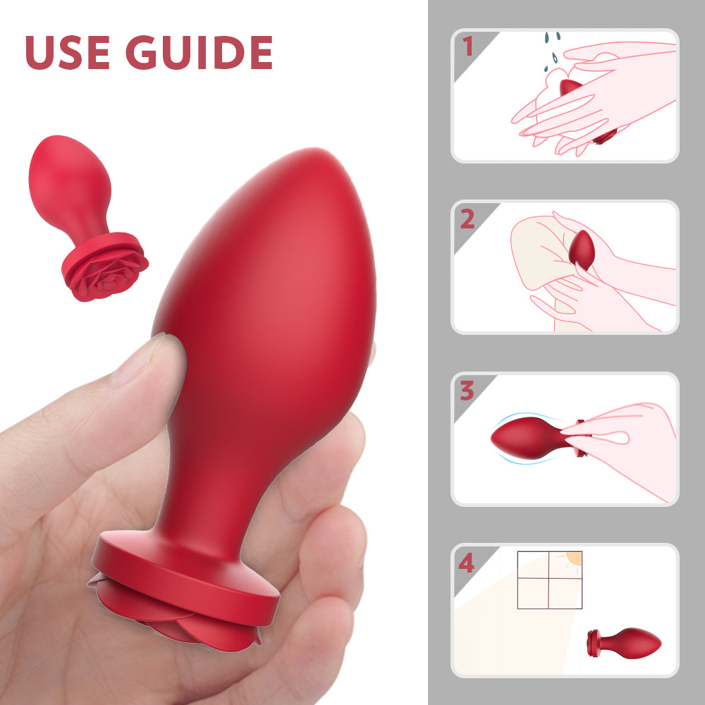 Red butt plug with rose design and cleaning instructions