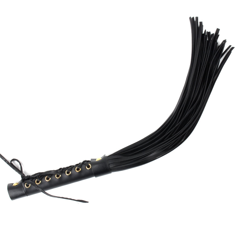 Black leather flogger with gold highlights