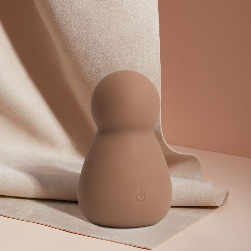 Powder Puff Love Egg Vibrator, taupe color, power button