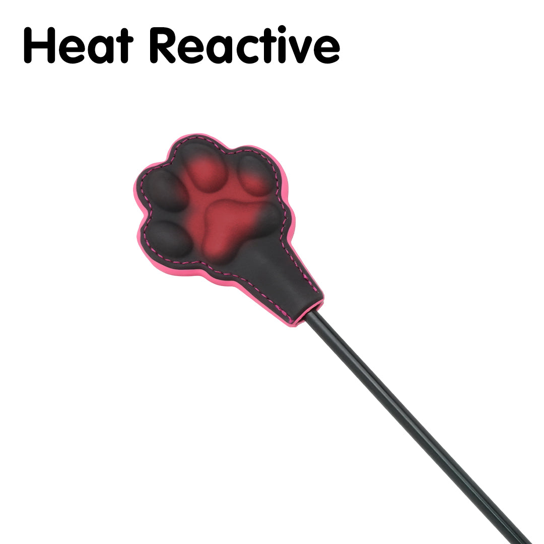 Cat paw heat reactive paddle with pink trim and red paw pad