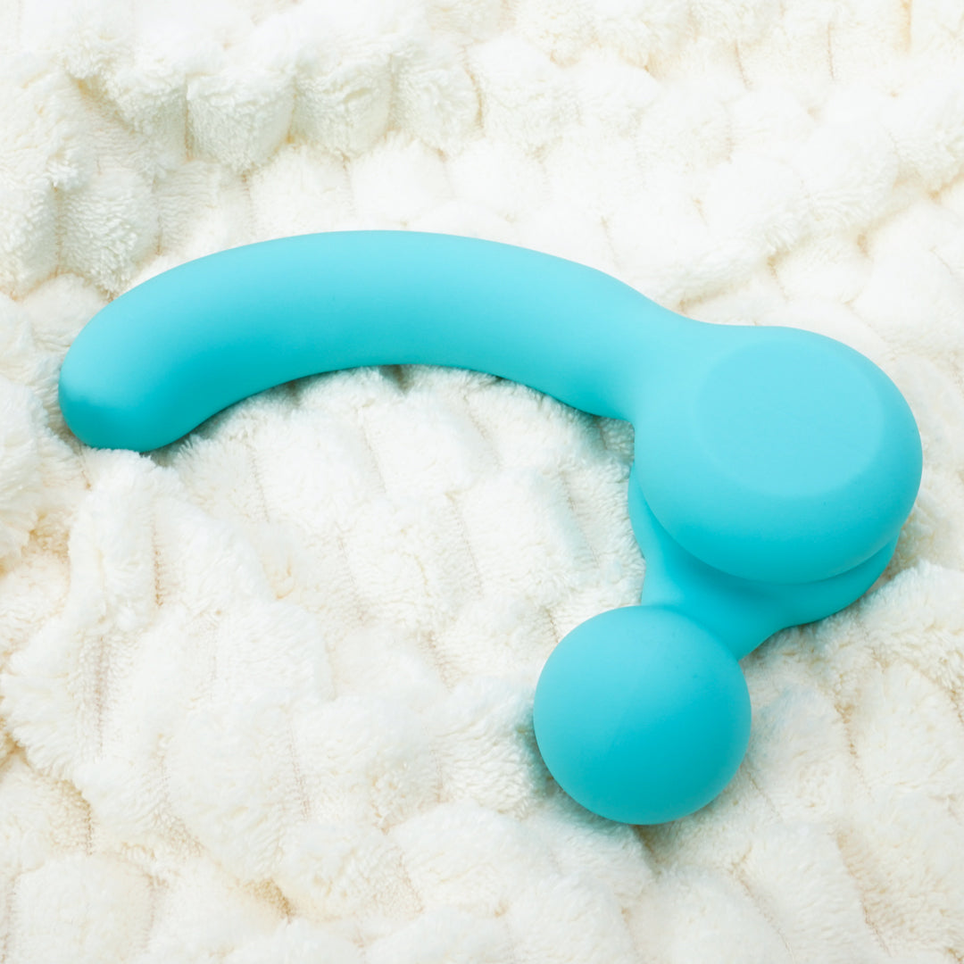 Teal Blue Bliss Detachable Vibrator on white cloth
