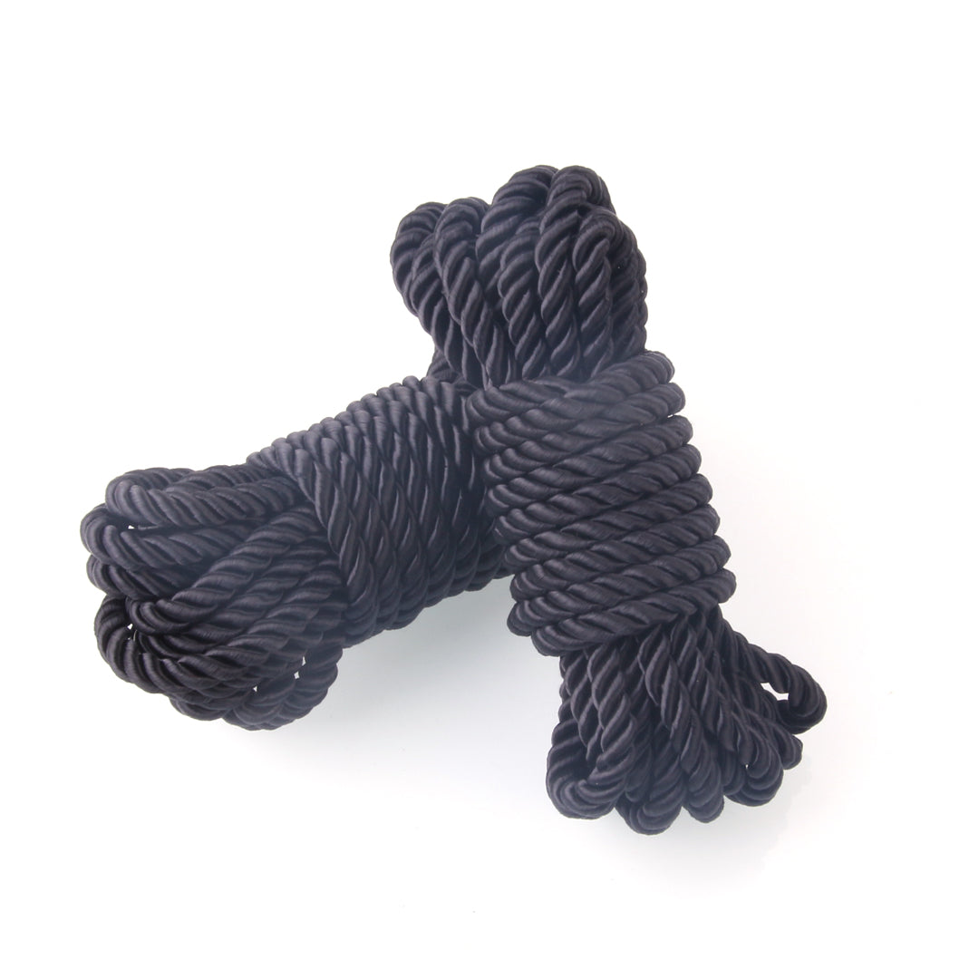 Black BDSM rope set for aesthetic use