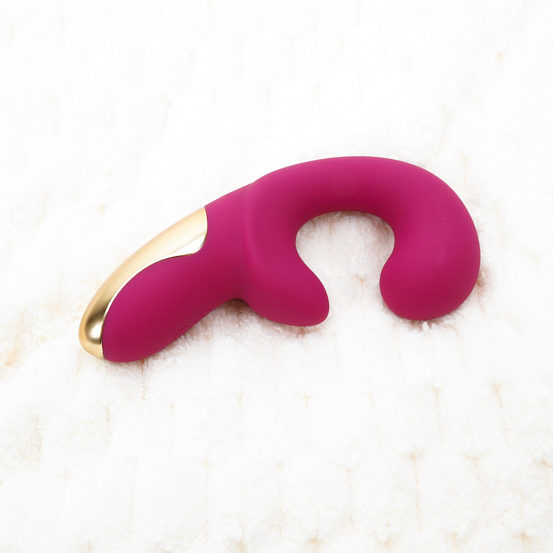 Pink clitoral rabbit vibrator with gold detail