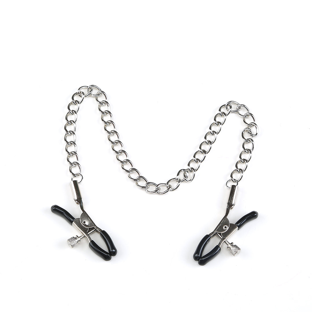 Nipple clamps with a chain. Teasing accessory for women.