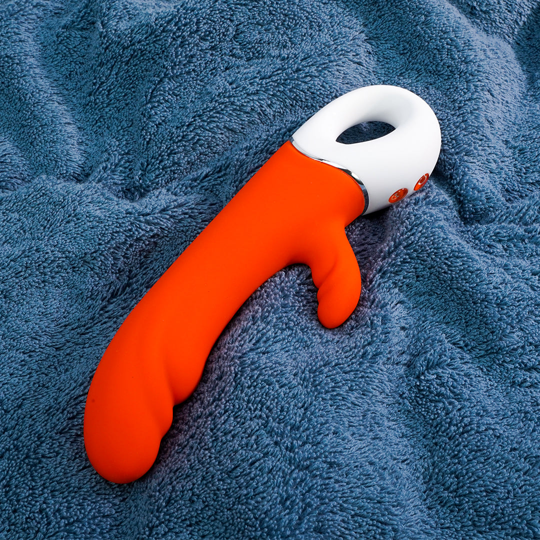 Orange rabbit vibrator for clitoral and G-spot stimulation