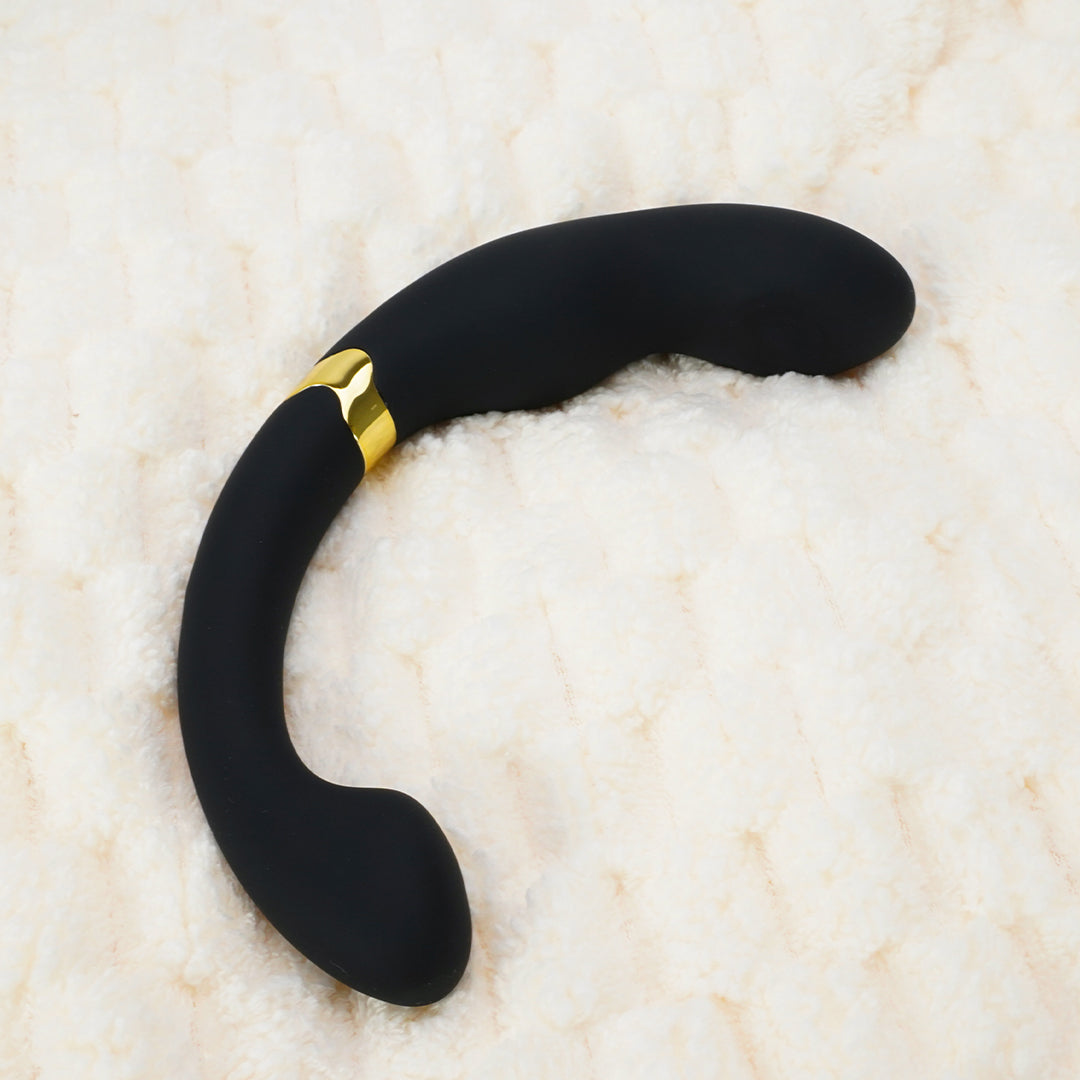 Black dual-ended prostate massager on white background