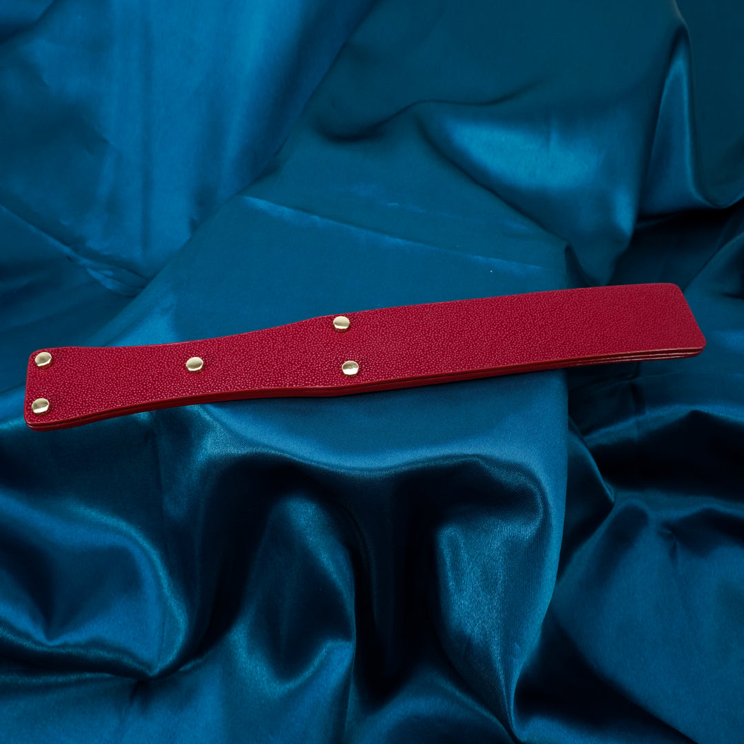 Red leather BDSM paddle with gold accents, Midnight Desire Bondage Set