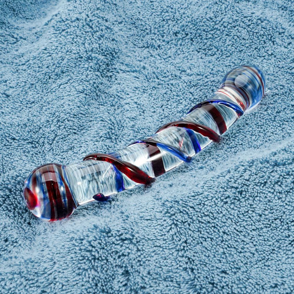 Spiral glass dildo with red and blue accents