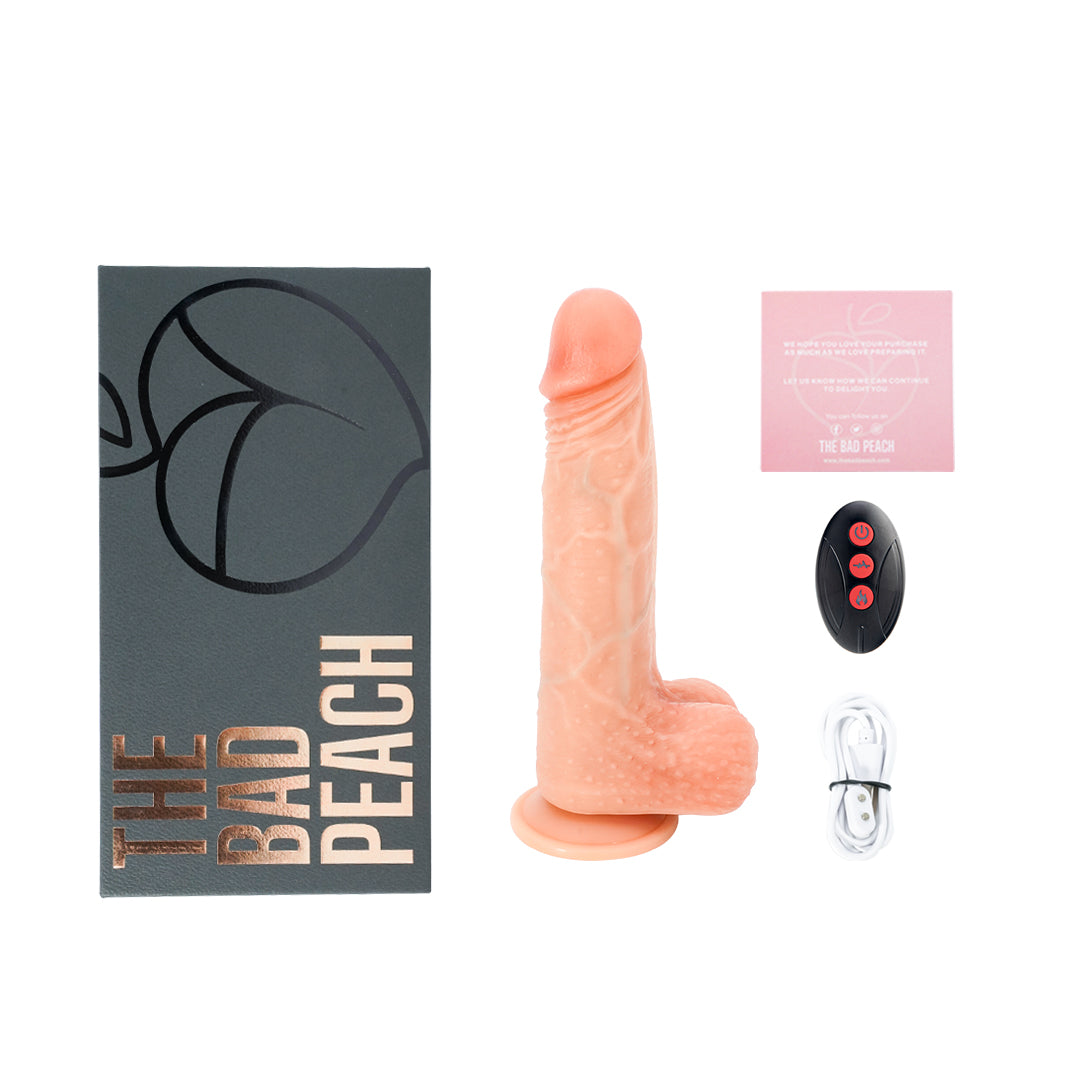 Amour Wave Dildo product with remote control and packaging from The Bad Peach
