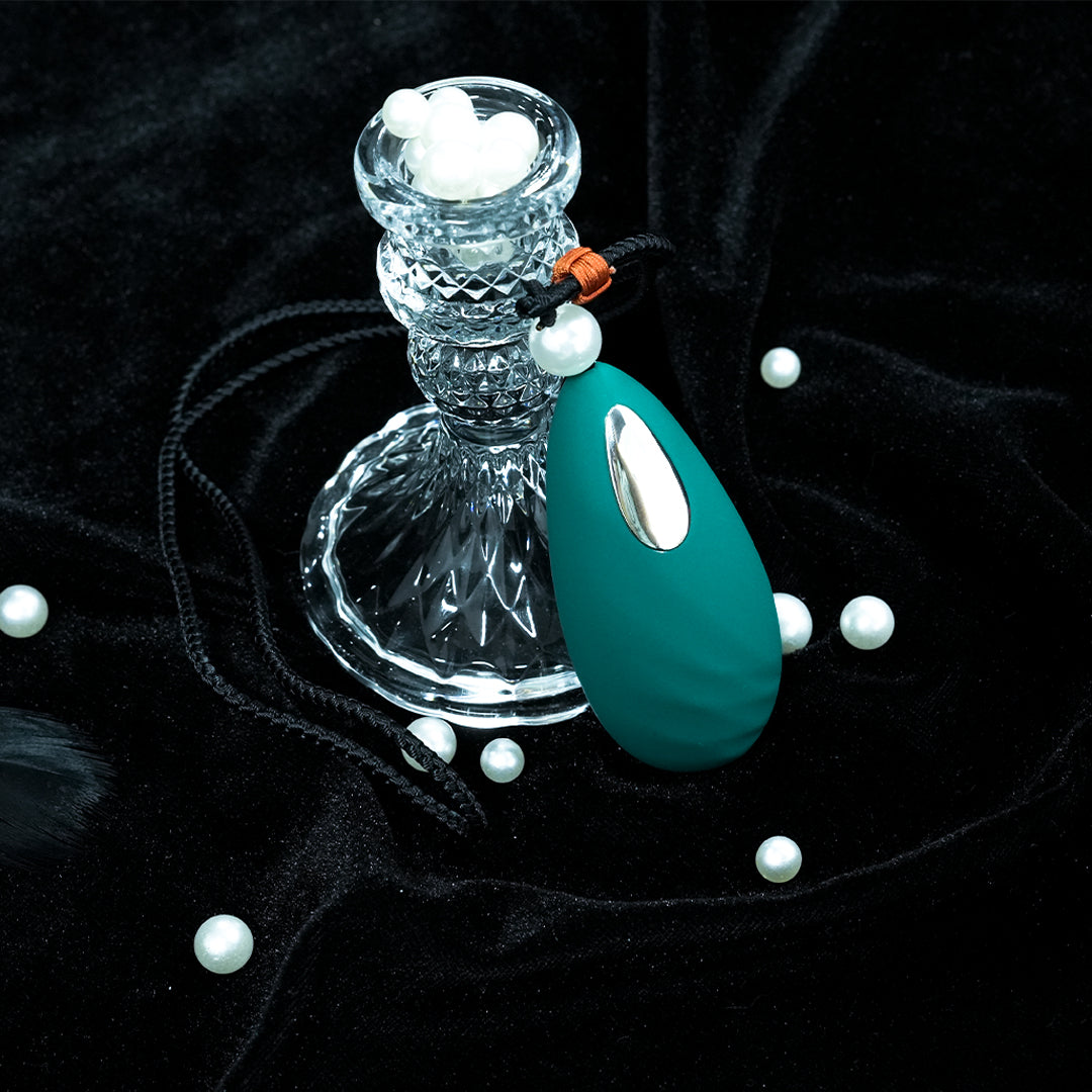 Vibrador en forma de huevo de amor con colgante de jade berilo