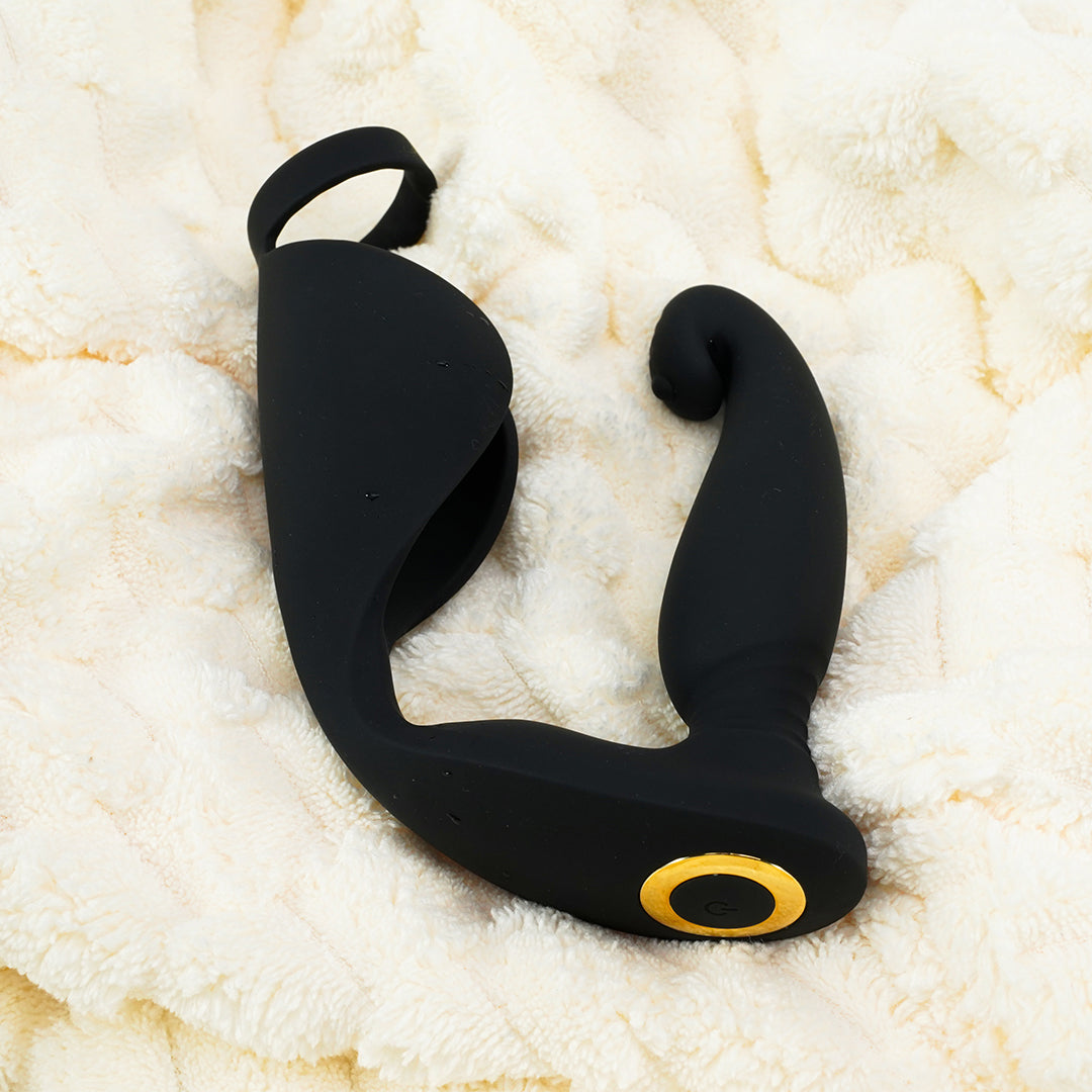 Black Raptor cock ring vibrator, with a gold ring.