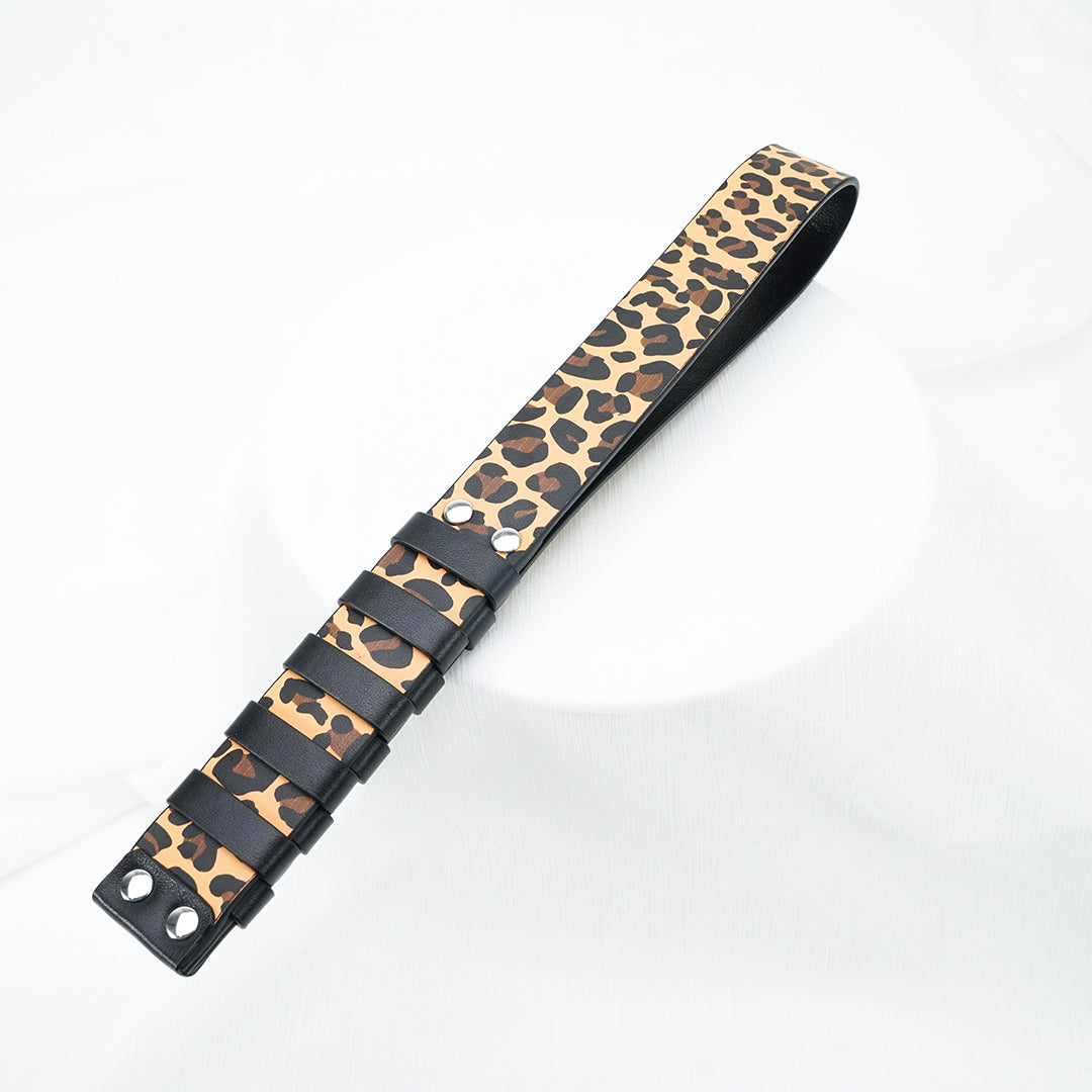 Leopard print flogger for BDSM play
